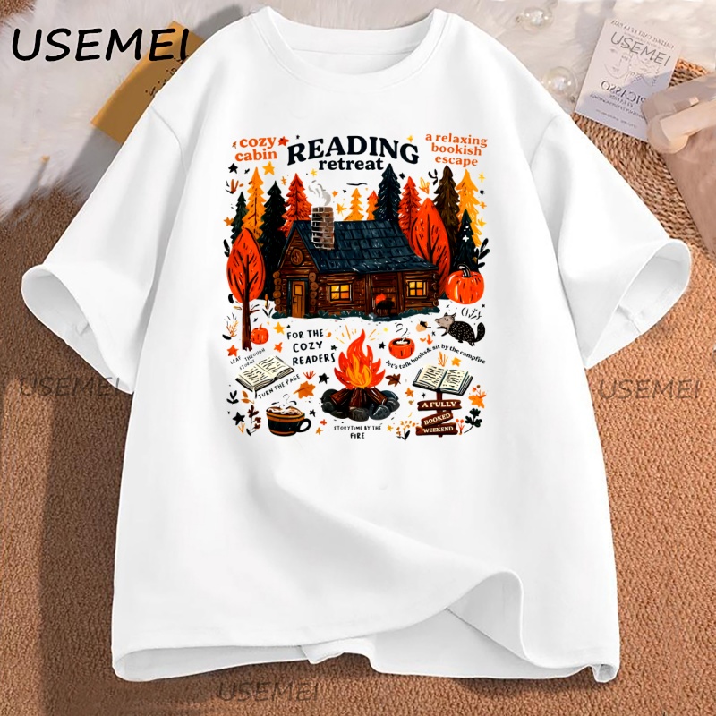 เสื้อยืดลาย Cozy Cabin Reading - Herbal Wellness Book บทวิจารณ์และราคา